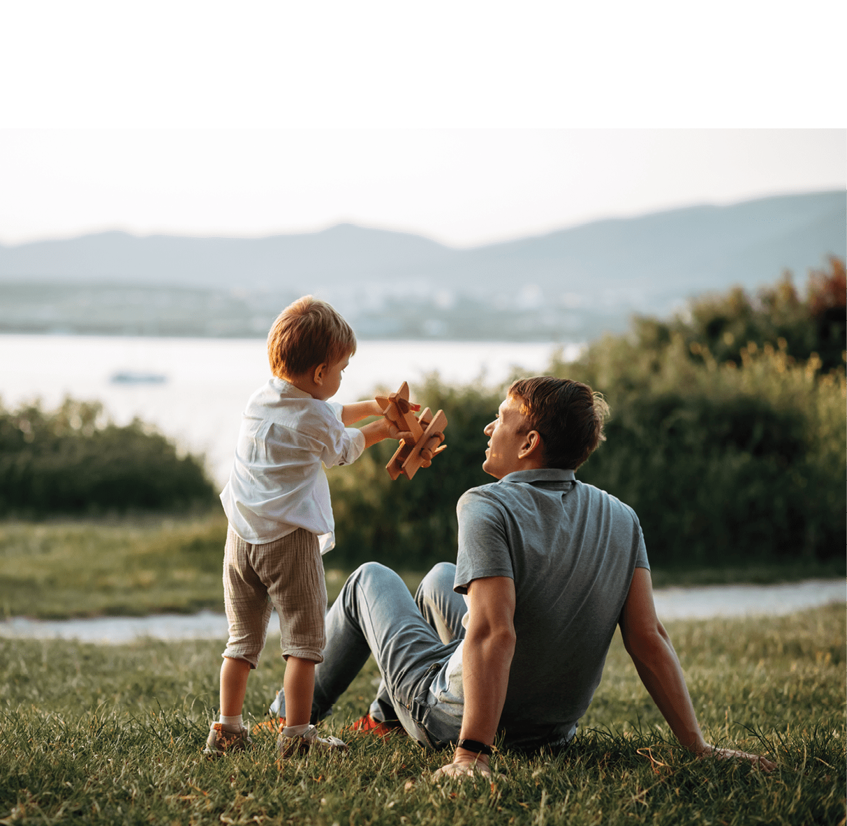 dad and son play on the seashore, vacation with children. Summer adventure, fun trip with kids. Fatherhood, Father's Day. Happy family travel and vacation concept